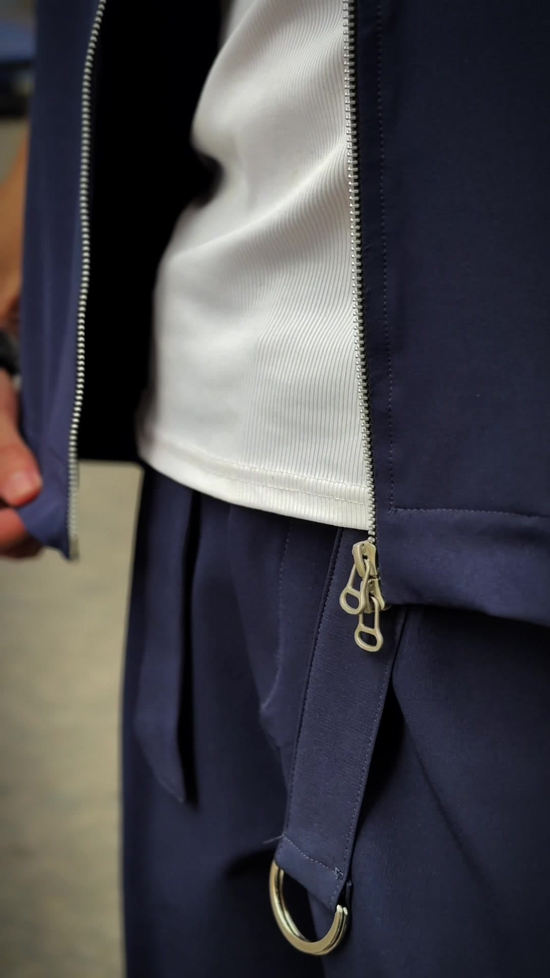 The Navy set worn open over a white tee, Downtown Cairo