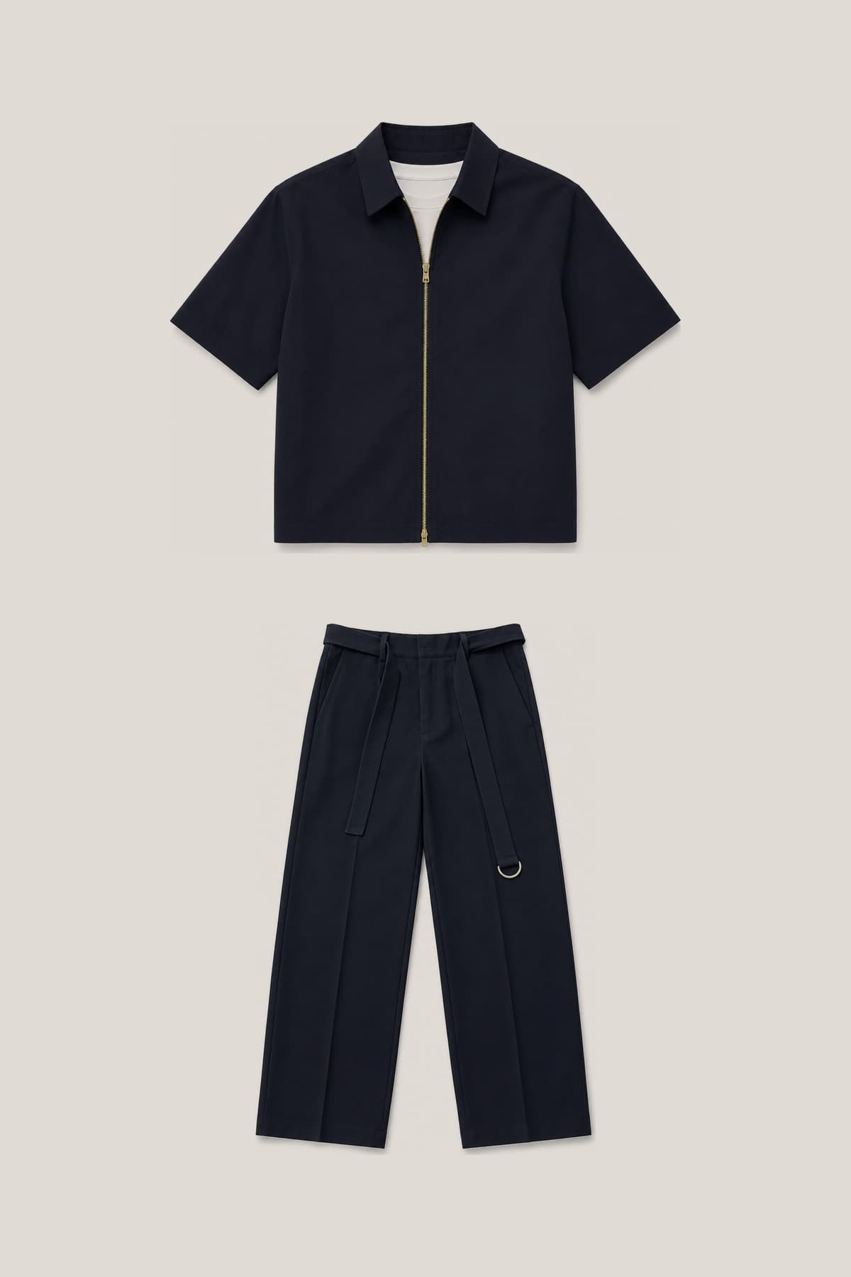 The complete Navy set laid flat, overshirt above the trouser